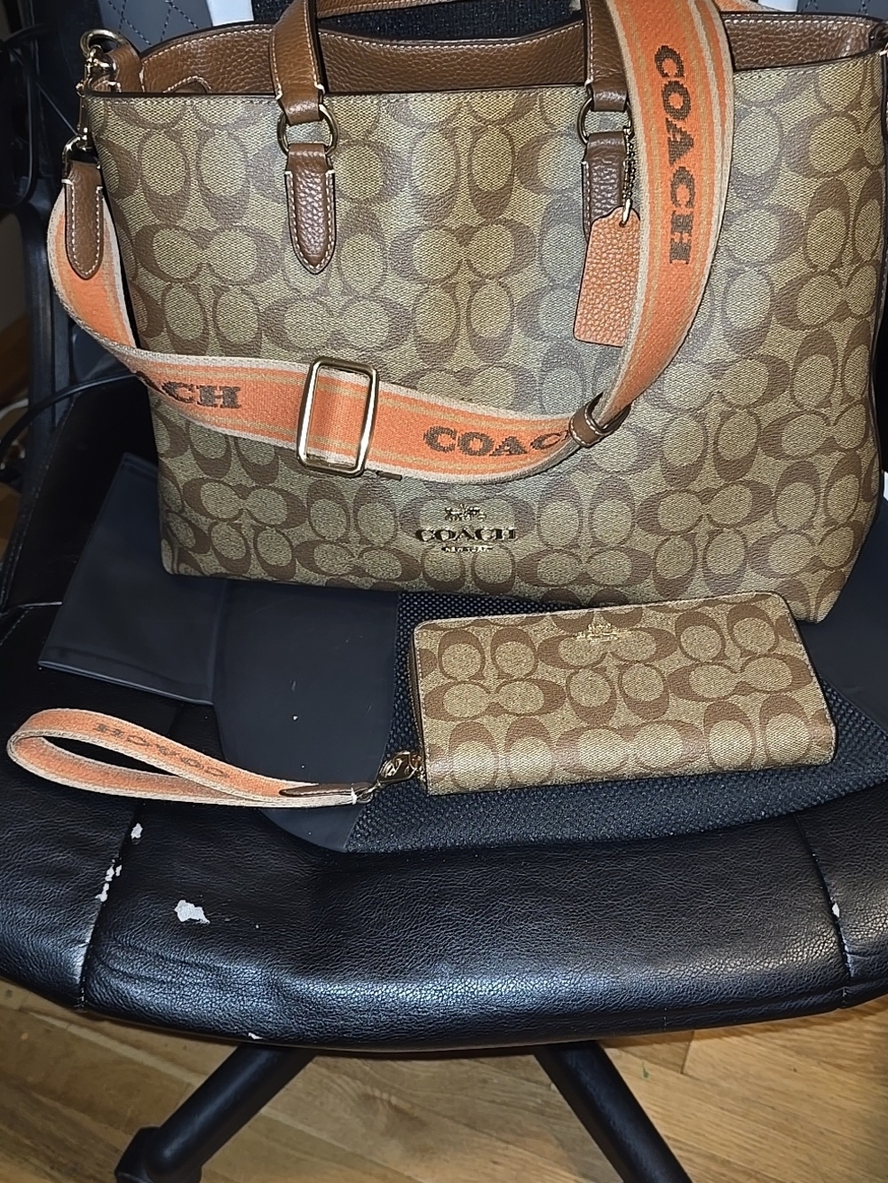 COACH Brown Signature Canvas Tote with Orange Strap